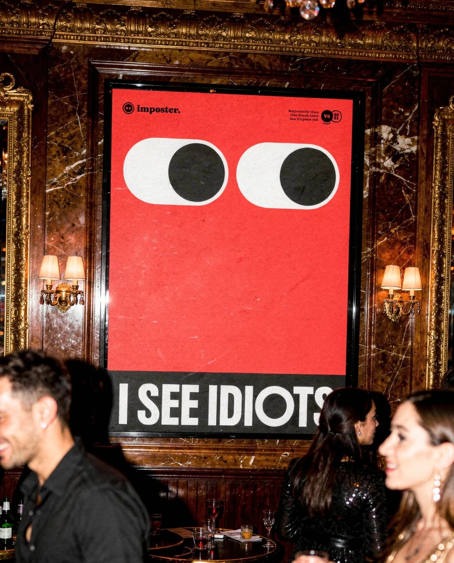 I SEE IDIOTS on a wall